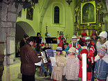 Zpívání koled v budislavickém kostele sv. Jiljí